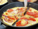 Large omelette with tomatoes