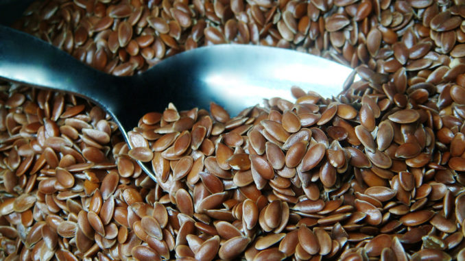 Spoon full of flaxseeds