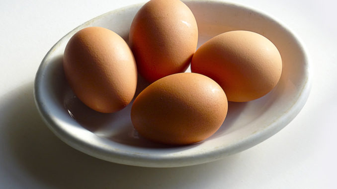 Bowl of four organic eggs